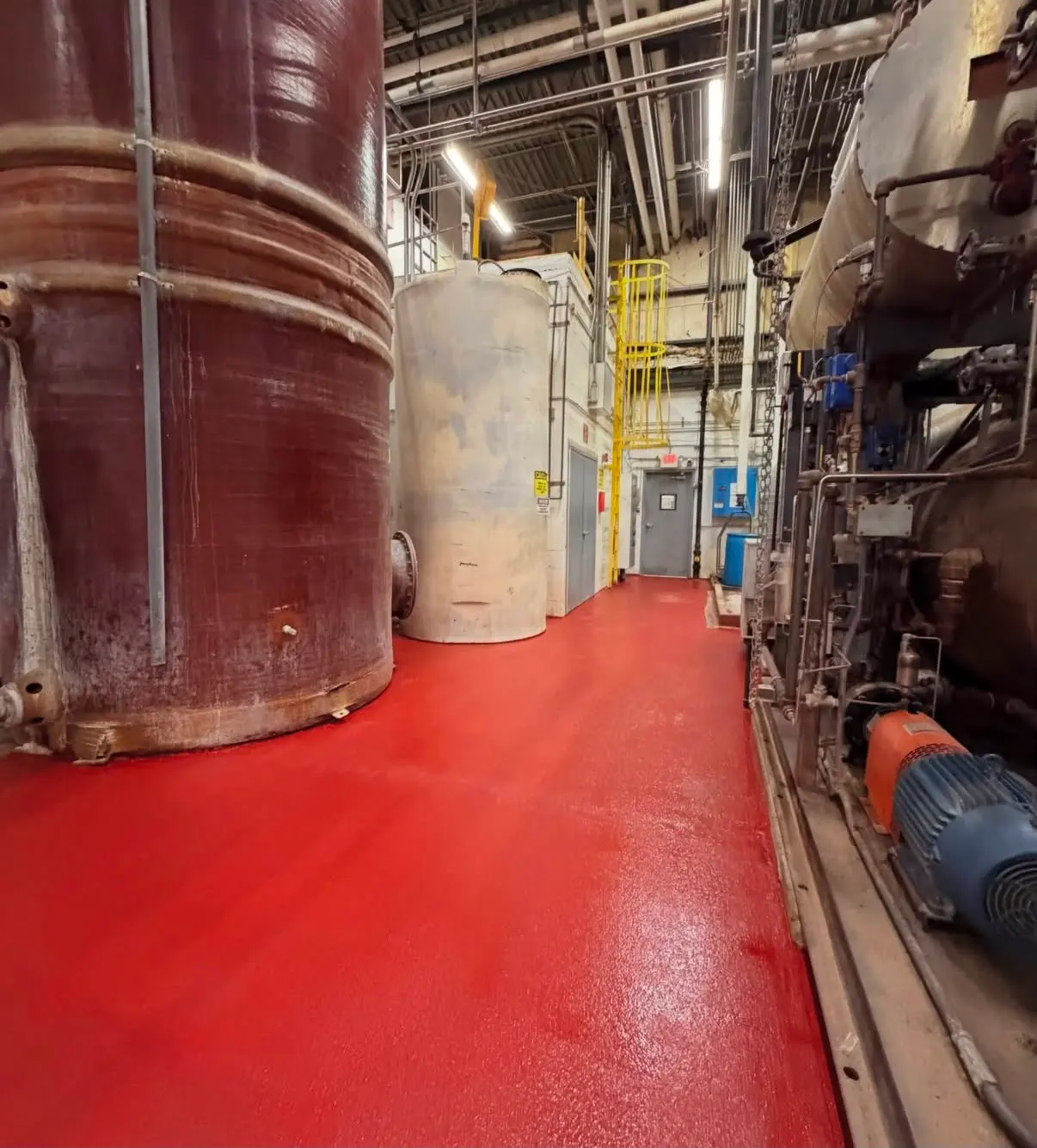 Red urethane cement floor between process tanks
